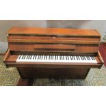 A Mickleburgh upright iron framed and over strung piano with polished teak case, painted number