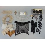 Collection of vintage beadwork items including black collar with choker style fastening, two