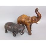 Leather clad elephant and hippo in the manner of Liberty, the elephant 37cm high (2)