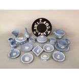 A collection of Wedgwood blue ground jasperwares comprising a ribbed bowl with lug handles and