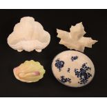 A small Royal Worcester salt modelled as a shell with matching spoon, 9 cm long approx, a Grainger