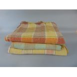 Three woollen woven blankets, all multi coloured