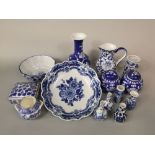 A collection of oriental and other blue and white ceramics including, a pair of small vases with