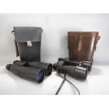 Two pairs of prismatic binoculars, one Japanese 8 x 56 with waterproof body covering plus a Ross