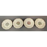 A set of four early 20th century Wedgwood plates by Louise Powell in the arts and crafts manner,