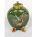 A 19th century green ground Minton's type moon flask vase and cover, probably Minton, with painted