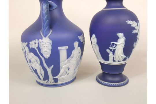 A 19th century Wedgwood blue ground jasperware copy of the Portland vase with impressed mark to base - Image 4 of 4