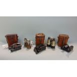 A box of five vintage prismatic and Galilean binoculars c1900-1910, four Ross (3 in original