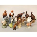 A collection of Royal Doulton spirit decanters in the form of birds, including a Beneagles Golden