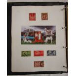 A collection of fourteen albums containing worldwide stamp collections including some mint sets