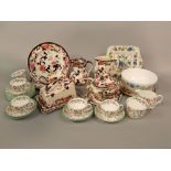 A collection of Minton Haddon Hall pattern tea wares, comprising milk jug, sugar bowl, six cups, six