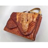 Taxidermy interest - an alligator purse with attached alligator head