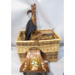A box containing a collection of treen items to include various figures, an interesting walking
