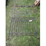Four sections of cast iron railing with gothic tracery detail, two 103 cm long x 88 cm high, the