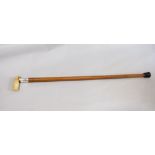 Malacca shafted ivory handled walking stick with silver collar