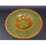 An impressive vintage mottled art glass bowl, the thick rim over a lobed bowl, in shades of orange