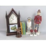 A mixed collection including an American Steeple mantel clock, an Austrian carved wood bear, four