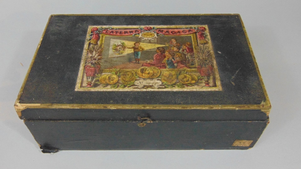 'The E.P. Magic Lantern' tin plate projector complete in original box with twelve coloured glass - Image 4 of 4