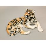 A USSR model of a recumbent tiger, 28cm long approx