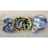 A pair of 19th century oriental blue and white dishes of circular form with painted character and