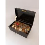 A tin box containing a large unsorted collection of bronze and silver coinage - 20th century