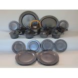 Charcoal coloured ceramics including 6 dinner and side plates, 6 lidded soup tureens, oval and round