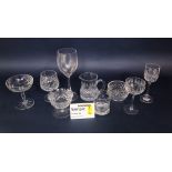 A large mixed collection of glassware to include cut glass goblets, rummers, sherry glasses