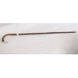 Good hawthorn type crook handled walking cane with silver collar and tip