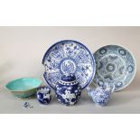 A collection of blue and white ceramics including a dish of circular form with stylised floral