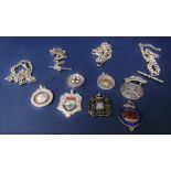 Collection of bijouterie silver to include seven silver medals, three with enamelled detail,
