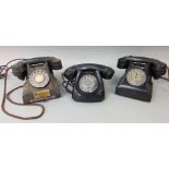 Three vintage Bakelite telephones, in a black colourway