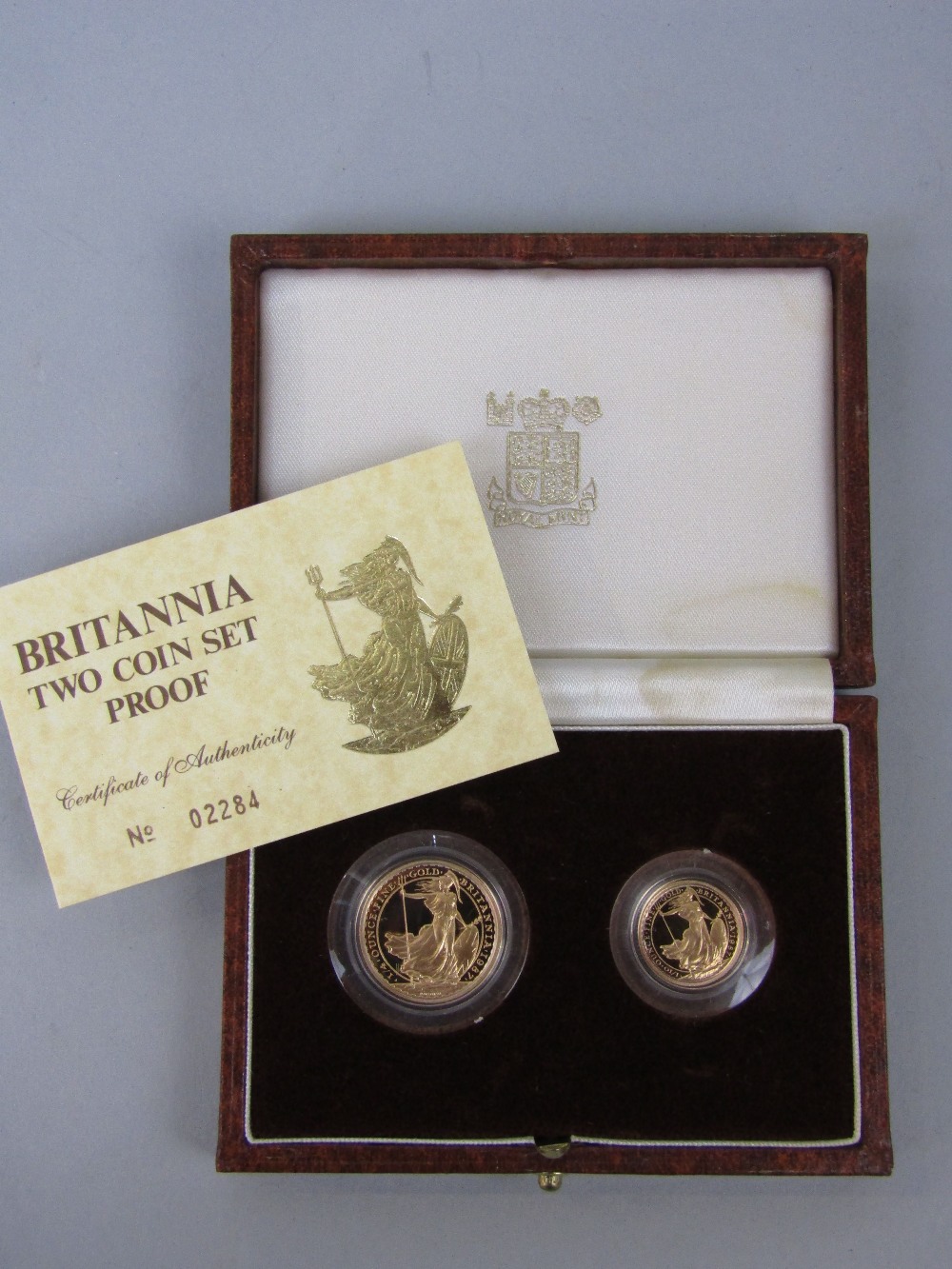 Cased 'Britannia Two Coin Set Proof', containing a £25 and £10 coin, 1987, no.02284