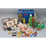 Toys and books including storage box containing small Lego pieces, Action Man with accessories,