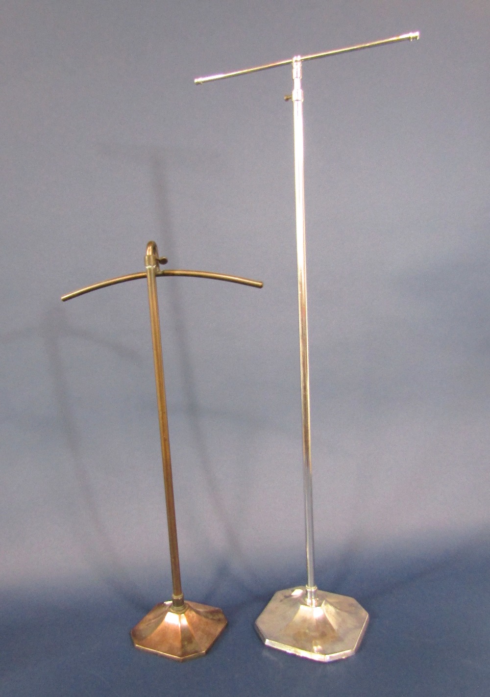 Two similar cast metal shop display stands, the largest 80cm high (telescopic) (2)