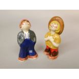 A pair of Wade condiments in the form of the Bisto Twins, 11.5cm tall approx