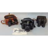 Small collection of optical equipment to include a pair of Bausch & Lomb binoculars, further pair of