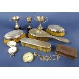 A box containing a collection of various silver items to include four silver applied dressing