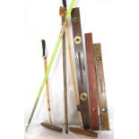 AAA approved javelin in a lime green colourway, two large mahogany spirit levels, a walking stick