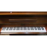 A small Kemble iron framed overstrung piano in a teakwood case, six octaves, serial number 185860,