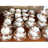 An extensive collection of Royal Albert Old Country Roses pattern teawares including teapot, two