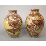 A matched pair of late 19th century Satsuma type vases with painted and gilded warrior and floral