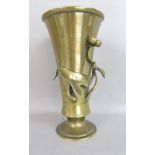 A late 19th century Japanese trumpet shaped vase in brass, surmounted by water lilies and a small