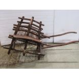 A Victorian child's hand/dog cart in timber with wire wheels