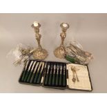 Mixed collection of silver plate to include a good pair of cast plated candlesticks with rams head