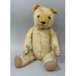 c1930s Teddy bear, 17" tall with pronounced short haired muzzle, stitched nose, mouth and claws,