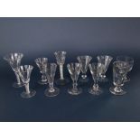 Mixed collection of antique glassware to include rummers, cordial glasses, etc, three with latticino