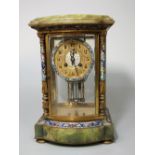 An onyx and cloisonne four glass mantle clock by Gibson & Co of Belfast, twin train drumhead