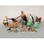 A Beswick model of a highland cow, together with further Beswick wares including a bald eagle number