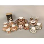 A collection of Royal Crown Derby wares including Imari pattern teawares and plates, coffee cans