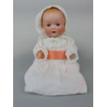 Bisque headed baby doll by Armand Marseille, marked 518/5k, with sleeping eyes, open mouth with